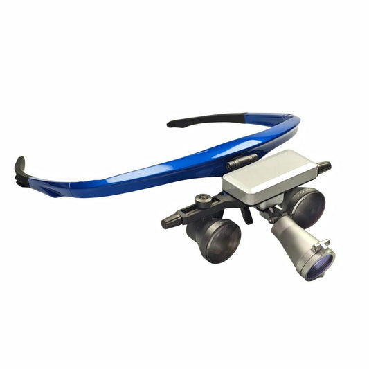 A high-definition wireless LED surgical headlight with a magnetic battery pack securely mounted on a professional blue-frame flip-up dental loupe system (2.5x or 3.5x magnification), showcasing an integrated cable-free clinical illumination and magnification solution.