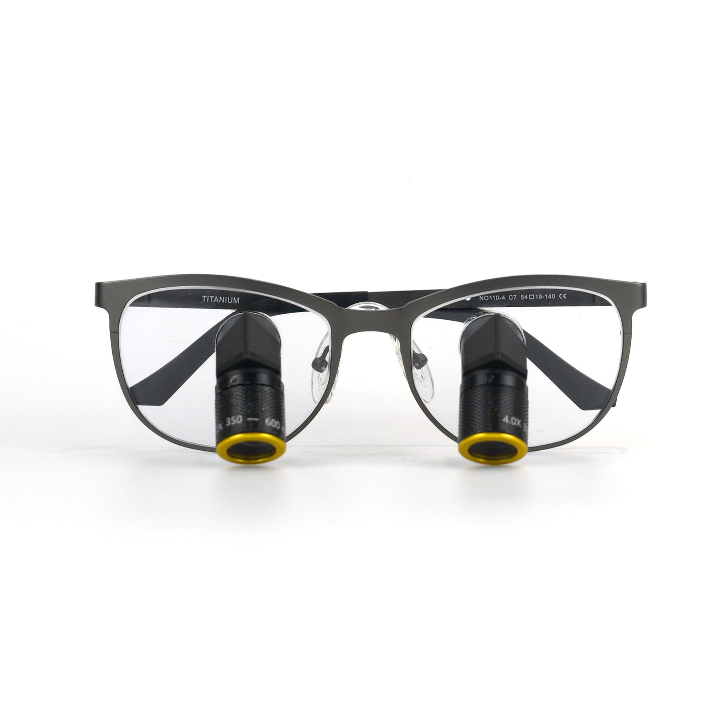 Product photograph of Oradenix Ergo TTL Ti Vario dental loupes on a white background, featuring a full-frame gray titanium frame with 'TITANIUM' marked on the temple. The integrated lenses show specific markings: '350 - 600' on the left lens for variable working distance and '4.0X' on the right lens for magnification. This 4.0X Vario system offers professional ergonomic clarity for dentists.