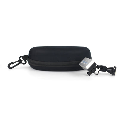 A product image displaying the Oradenix ProLite wireless surgical LED headlight resting next to its included sturdy black protective travel case. The zippered hard-shell case features a convenient carabiner clip, highlighting the portability, safe storage, and travel-friendly design of this premium dental illumination system.