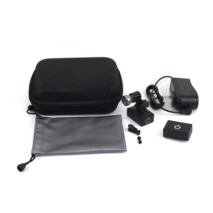 A comprehensive flat-lay view displaying the complete package contents of the Oradenix® wireless surgical LED headlight system. The professional kit includes a premium black protective EVA carrying case, a sleek grey microfiber storage pouch, the main articulated LED lamp unit with an attached HapticSense™ touch-control battery, a second quick-swap lithium battery unit for uninterrupted workflow, a rapid-charge power adapter, and custom mounting clips. This complete dental headlight set provides everything 