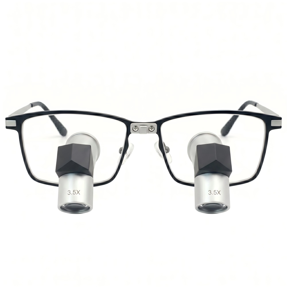 Front view of Oradenix premium TTL loupes featuring elegant silver-white metal lens barrels with 3.5x magnification marking, integrated into a sleek black and silver aerospace-grade titanium frame isolated on a pure white background. Designed for ergonomic posture and high-precision professional laboratory work.