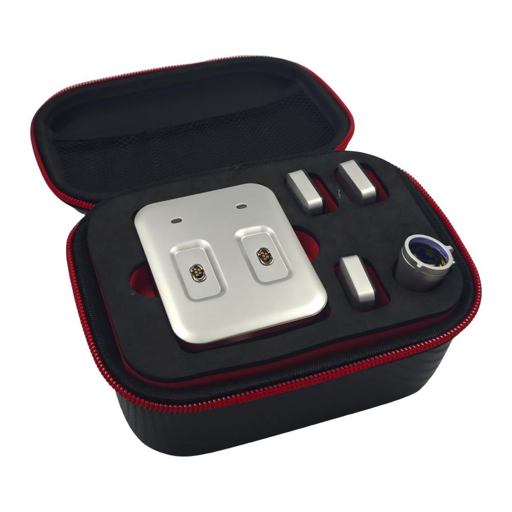 Interior view of the professional carrying case for the magnetic surgical headlight kit, showcasing the organized storage of the lamp unit, three battery packs, and the dual-bay charging dock, ensuring equipment protection and portability in clinic and laboratory settings.
