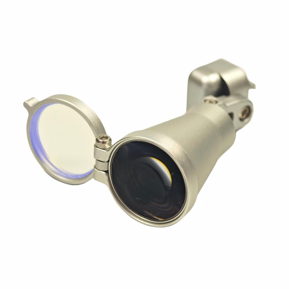 Close-up of the professional LED light unit for dental loupes, featuring a flip-up orange curing filter and a high-grade aluminum housing for optimal thermal dissipation, ensuring consistent high-intensity illumination during restorative and surgical procedures.