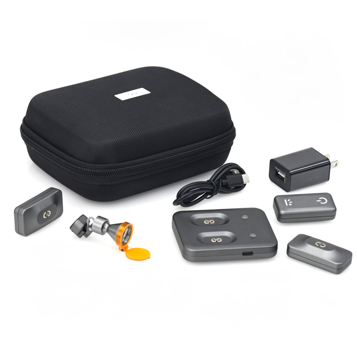 Complete package of wireless dental headlight system including LED light, 3 lithium batteries, dual charger, power adapter, and protective carrying case