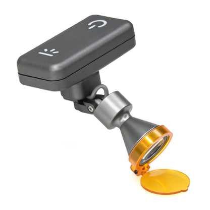 Close-up detail of wireless dental loupe headlight showing touch sensor controls, adjustable pivot joint, and flip-down yellow optical filter